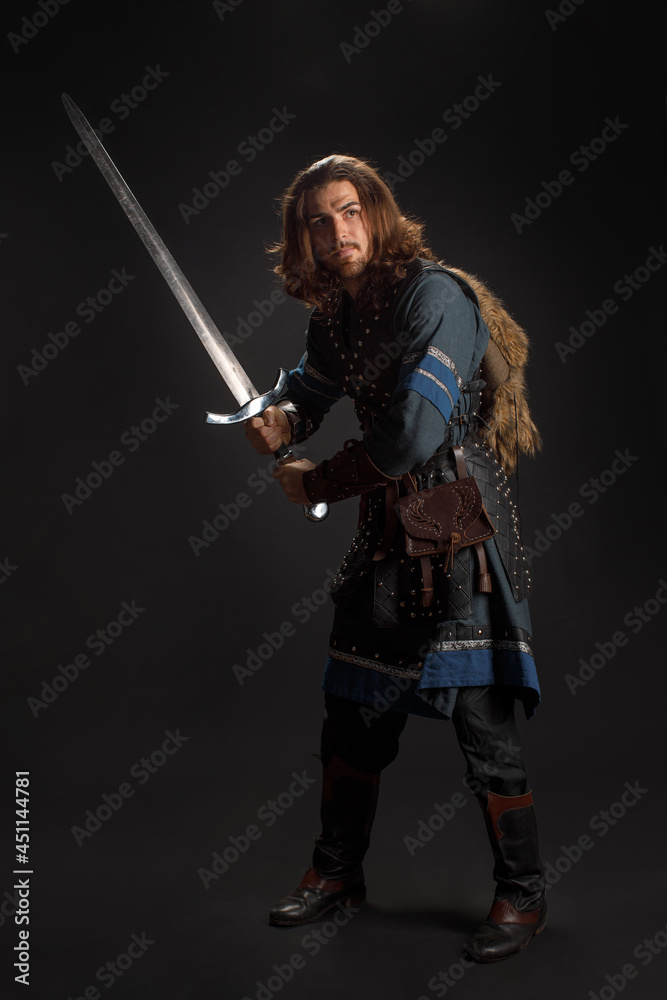 Medieval knight with sword in armor as style Game of Thrones