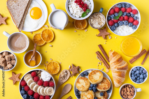 Wallpaper Mural The continental breakfast is captured from above, top view. Coffee, croissants, granola, Belgian waffles, honey, jam. Layout with free text space, copy space Torontodigital.ca
