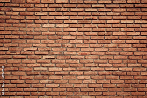 Red brick wall seamless background - texture pattern for continuous replicate.