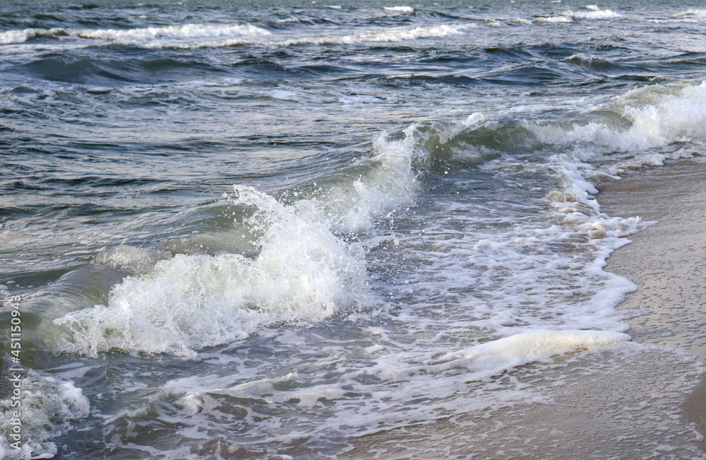 Fototapeta premium Sea waves. Great waves on the beach.
