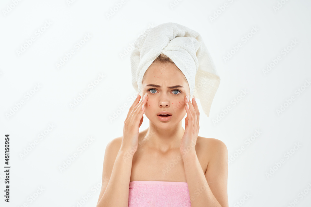 woman with towel on head bare shoulders clear skin healthy light background woman with towel on head bare shoulders clear skin healthy light background