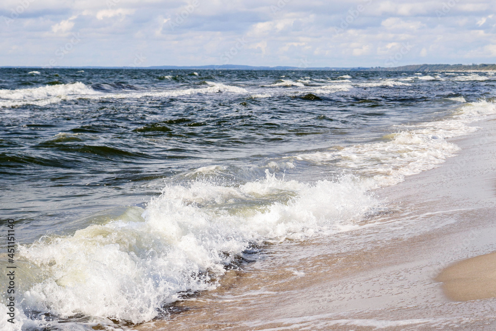 Fototapeta premium Sea waves. Great waves on the beach.