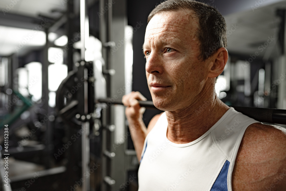Portrait of a senior muscular man in a gym Portrait of a senior muscular man in a gym