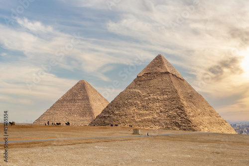 The Pyramid of Khufu and the Pyramid of Khafre with dramatic sky in Egypt