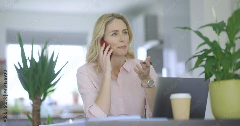 Confident businesswoman talking on the phone Confident businesswoman talking on the phone