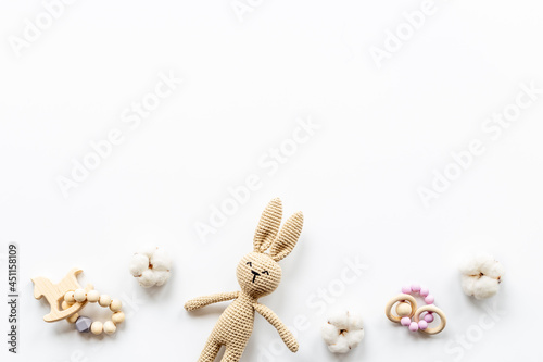 Plush toy rabbit for newborn baby - background for baby shower