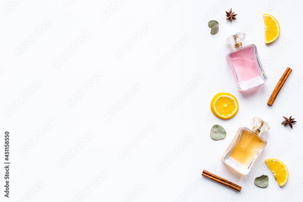 Set of perfume bottles with fragrance spaces and fruits Set of perfume bottles with fragrance spaces and fruits