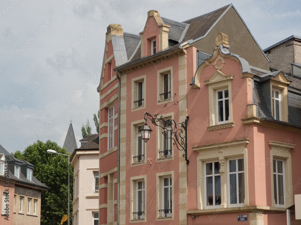 A pink facade perspective in Echternach