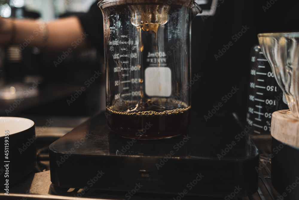 barista dripping coffee and slow coffee wooden bar style barista dripping coffee and slow coffee wooden bar style