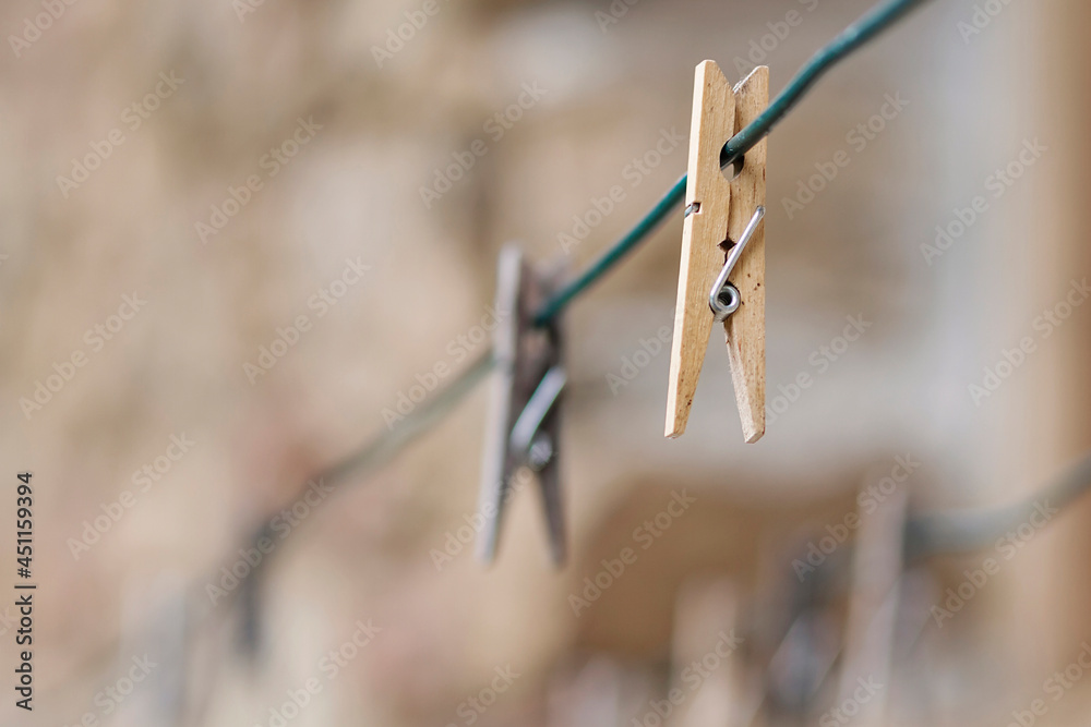 Old and faded clothespins in a country farm