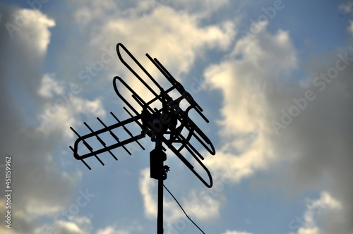 Indonesian local TV antenna with blue sky background