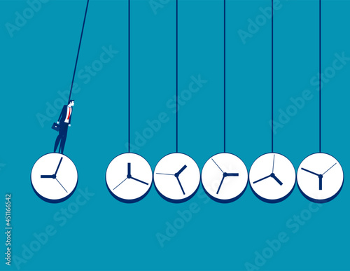Business time management. Newton's cradle with watch