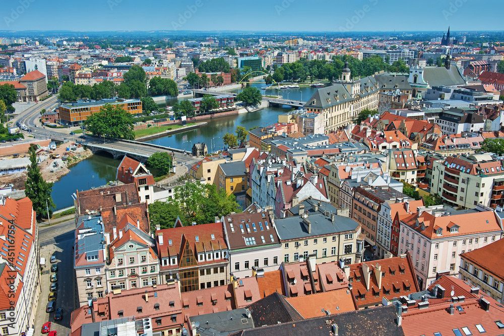 Naklejka premium old european polish city Wroclaw from above, aerial view on city center and bridges through the river