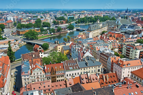 old european polish city Wroclaw from above, aerial view on city center and bridges through the river