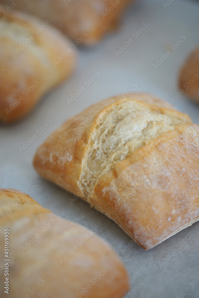 Fresh ciabatta bread rolls after baking