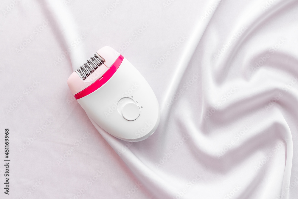 Hair remover epolator on silk - for gentle depilation Hair remover epolator on silk - for gentle depilation