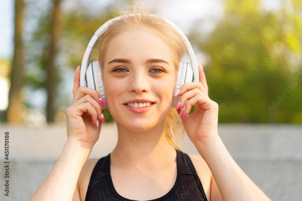 Sport and Fitness Young Adult Caucasian Woman Resting after morning Workout Outdoor Summer Park Sport and Fitness Young Adult Caucasian Woman Resting after morning Workout Outdoor Summer Park