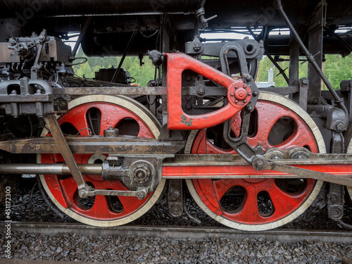 Wheels and mechanisms of a steam locomotive at the Ruskeala station in Karelia