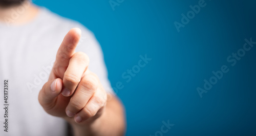 Businessman pointing or touching finger in screen..