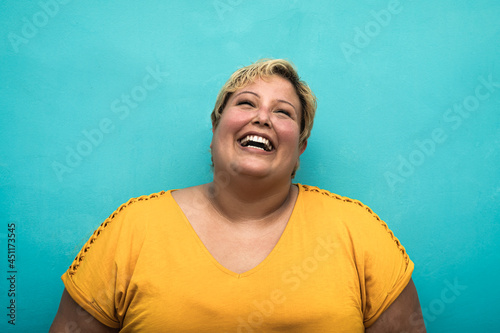 Happy plus size smiling woman portrait photo