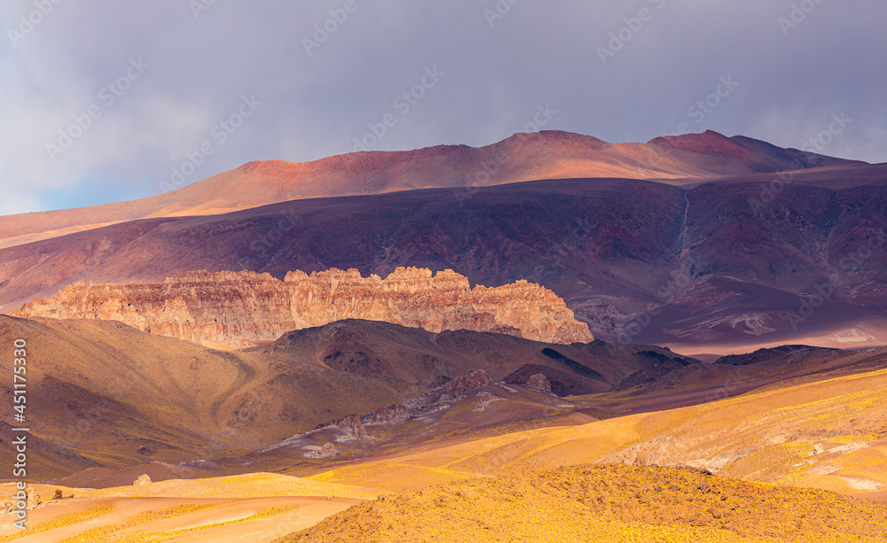 Landscape with volcanic rocks and hills on the puna in northwest Argentina
