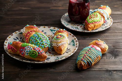 Guagua and colada morada for day of the dead, guagua de pan, wawas de pan, bread of the dead in Bolivia, Ecuador, Peru