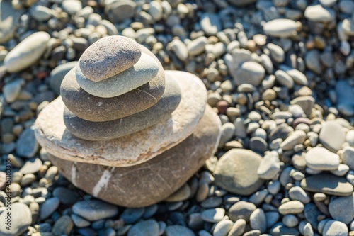 Photography Balancing sea stone on beach background