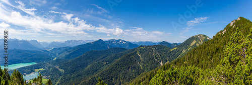 Lake and mountains. Panoramic Aerial view of Bavarian village Walchensee with Alp Lake Walchensee in Bavarian Prealps in Germany  Europe. view from the Herzogstand over the beautiful Walchensee
