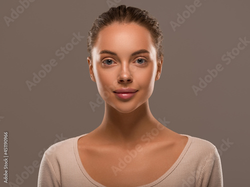 Beautiful woman healthy skin natural beauty close up face studio female portrait