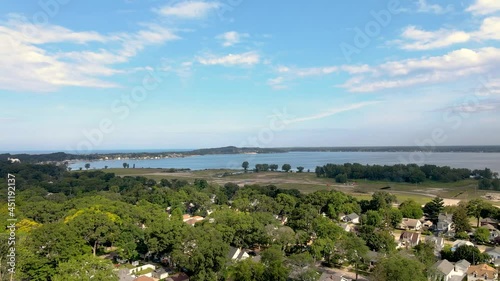 Aerial pan up over Muskegon Lake in the Lakeside neighborhood of Muskegon. photo
