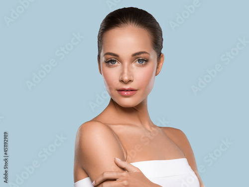 Beautiful woman natural make up studio portrait healthy beauty skin smile female young model photo