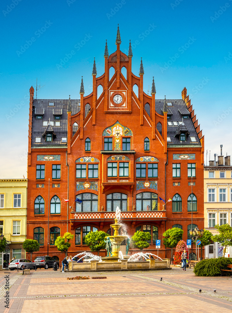 Obraz premium Panoramic view of old town quarter with historic Rynek Market Square and gothic Ratusz Town Hall in Chojnice in Poland