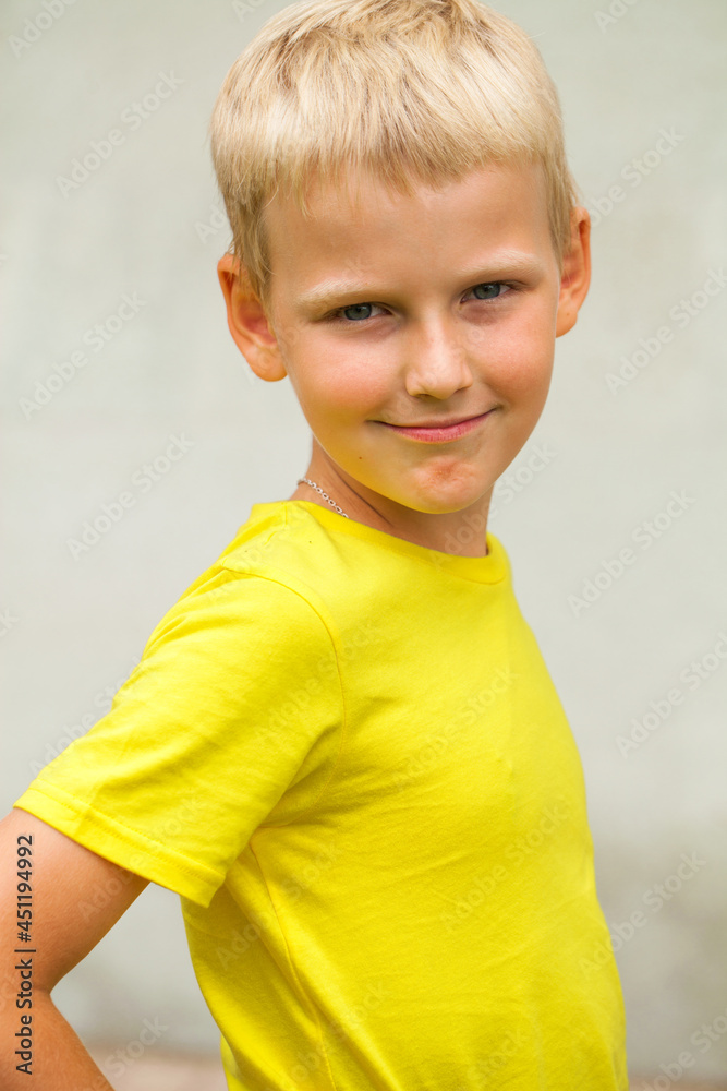 Blonde little boy in a summer park Blonde little boy in a summer park
