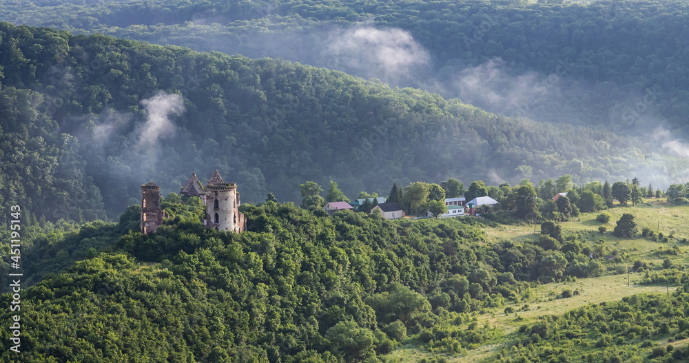 Fototapeta premium castle ruins on the background of the landscape of Ukraine Nyrkiv