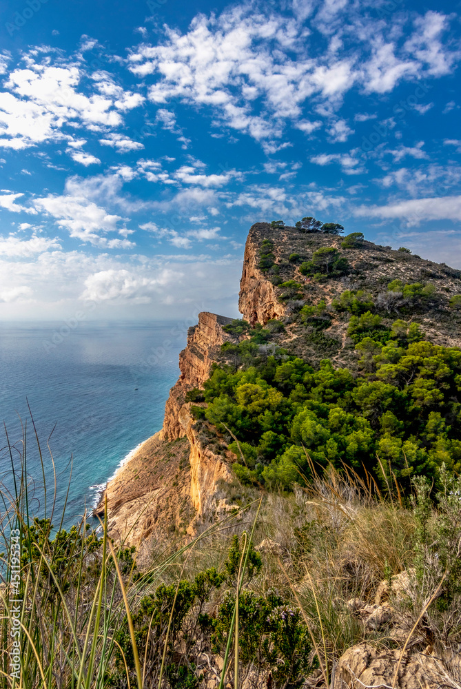 natural park serra gelada in benidorm. view of cliffs in a clouds sky, landscape located in the Valencian community, Alicante, Spain