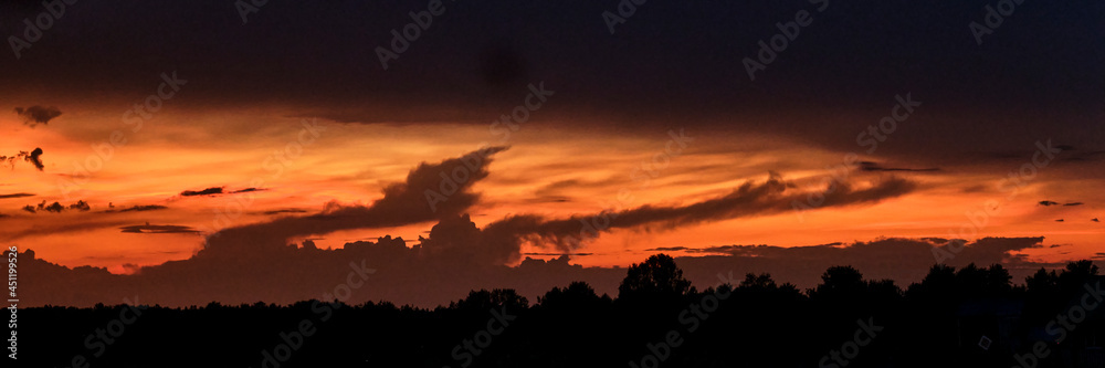 Beautiful dramatic sunset in yellow-red and orange colors.