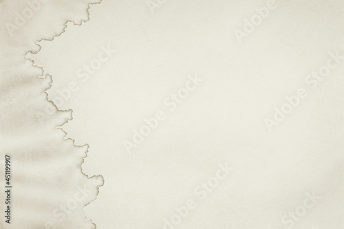 Wet stained paper background. Paper texture with water stains