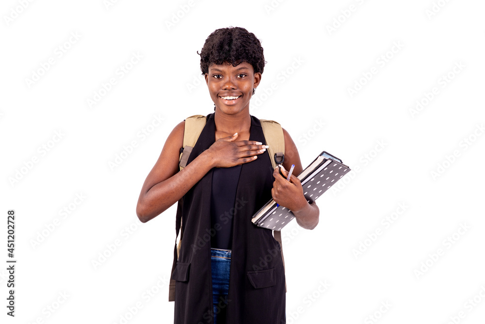 beautiful young happy student girl laying hand on her chest. beautiful young happy student girl laying hand on her chest.