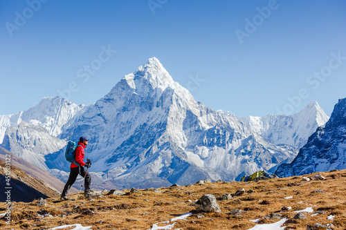 Konstfotografi Happy hiker walking in the mountains