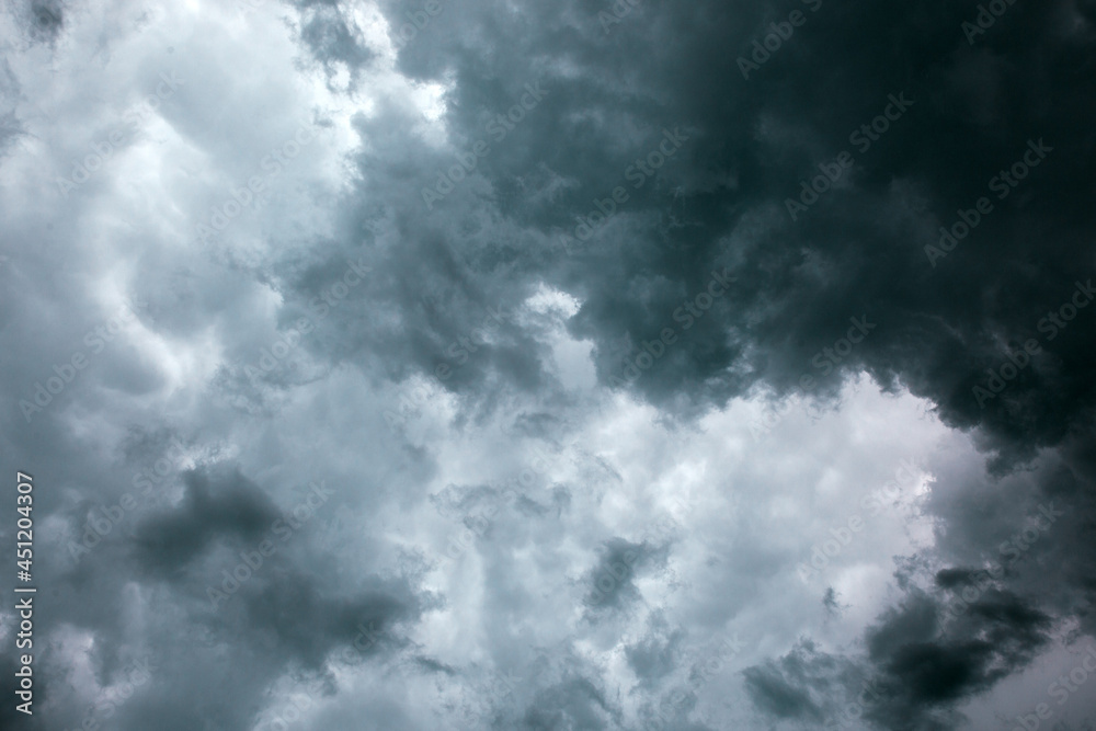 Fototapeta premium Dark ominous grey storm clouds. Dramatic sky.