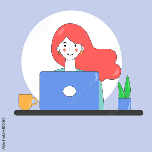 A girl, a red-haired woman sits at her laptop, a computer. Online work, online study.
