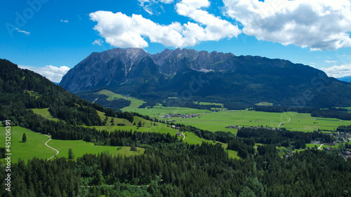 Amazing scenery and typical landscape in Austria - the Austrian Alps from above - travel photography by drone