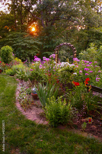 Fototapeta Naklejka Na Ścianę i Meble -  Backyard Garden In The Evening