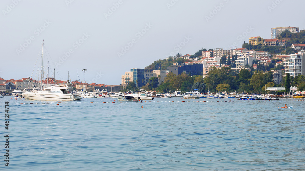 View of the city and the seaport. Budva is one of the best-preserved medieval cities in the Mediterranean and the most popular resorts.