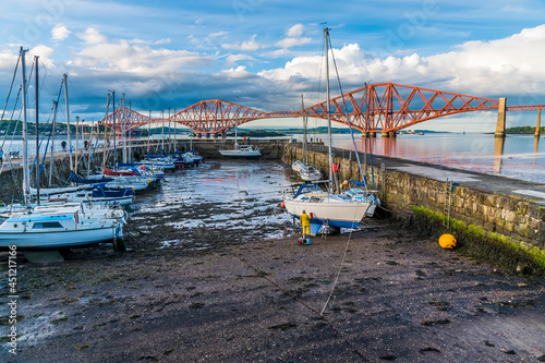 A view across the harbour and Firth of Forth in Queensferry, Scotland on a summers day photo