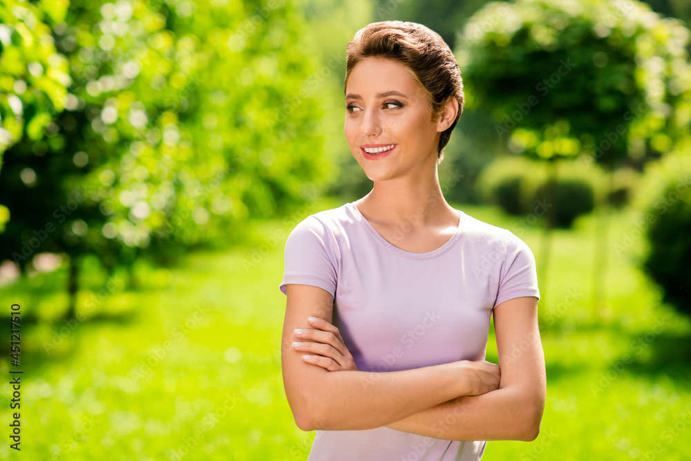 Portrait of attractive cheerful dreamy brown-haired girl daydream outside folded arms sunshine fresh air outdoors Portrait of attractive cheerful dreamy brown-haired girl daydream outside folded arms sunshine fresh air outdoors
