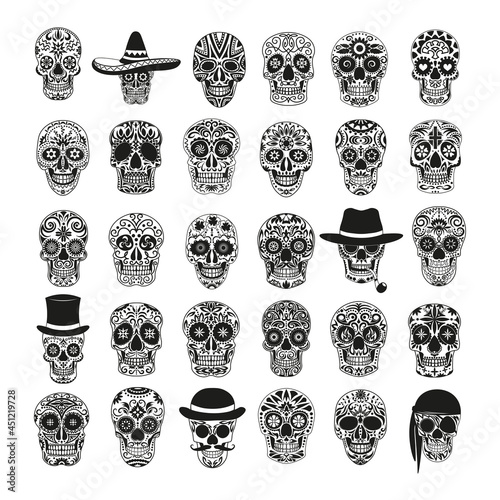 Set of black and white skulls for the day of the dead. Illustrations in the Mexican style for creating stickers, tattoos, prints.