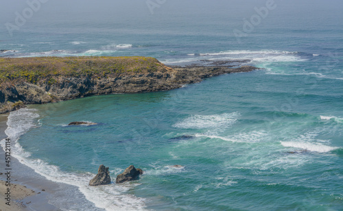 The rocky coastline at Mackerricher State Park on the Pacific Ocean in Fort Bragg, Mendocino County, California photo