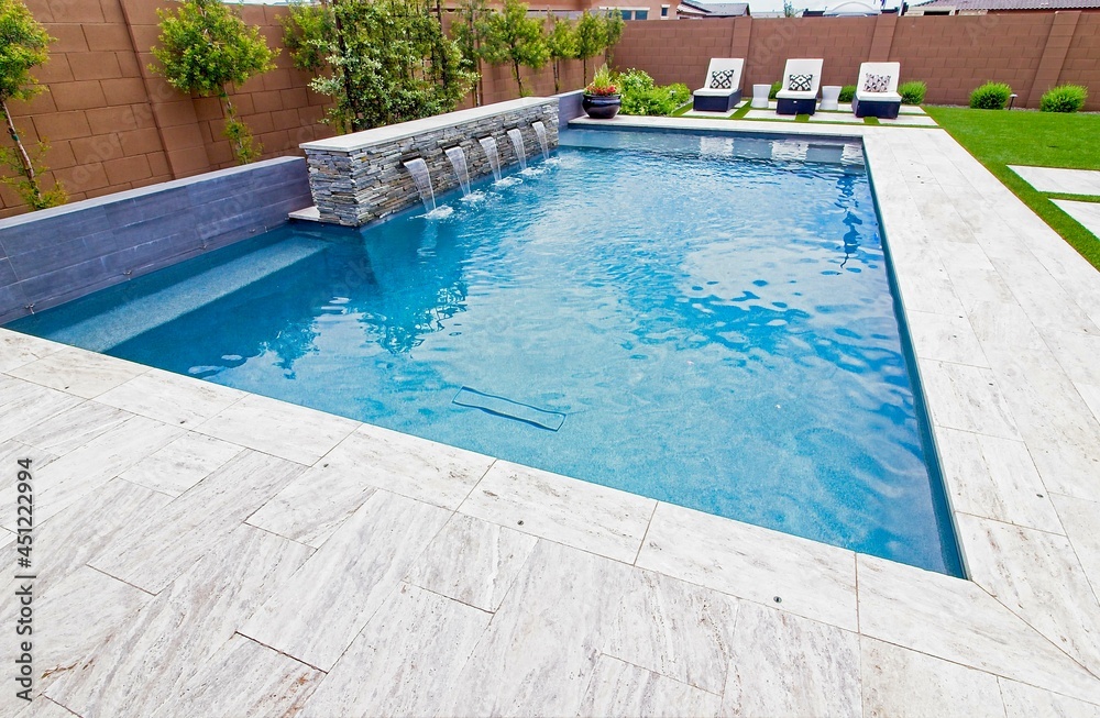 Outdoor Swimming Pool With Three Lounge Couches