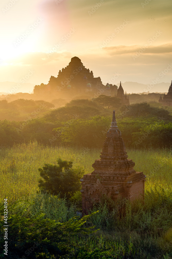 Myanmar (ex Birmanie). Bagan, Mandalay region. Sunset at the plain of Bagan with the Dhammayangyi temple in a background